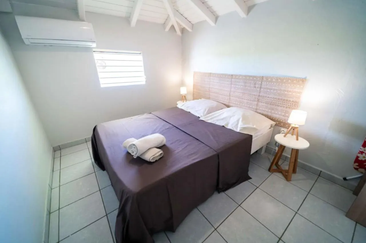 Holiday home Maison Charmante A Sainte-Anne Avec Piscine Partagee.